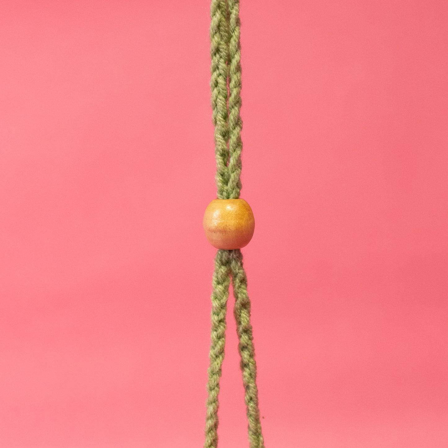 greens string with adjustable bead