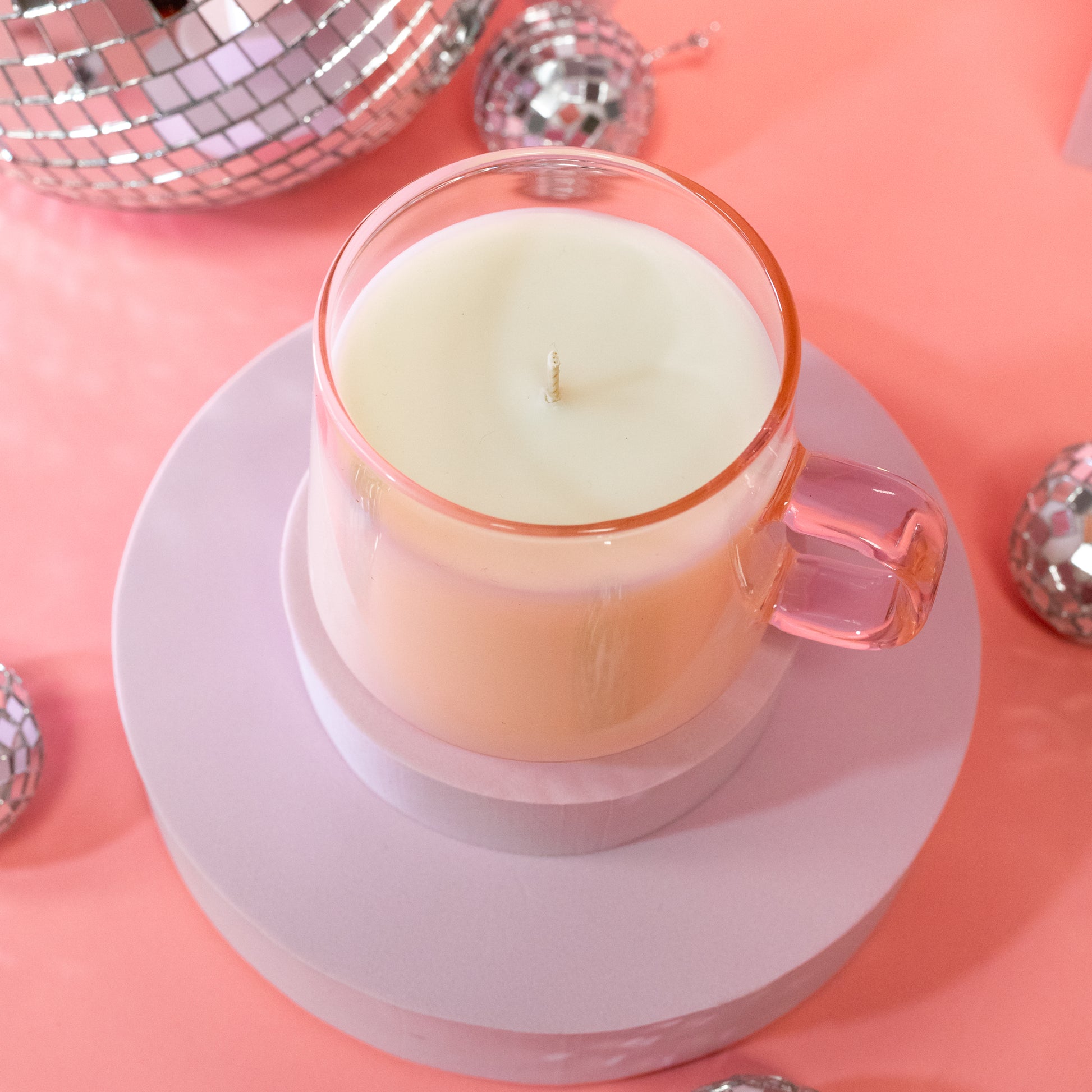 pink candle in a mug