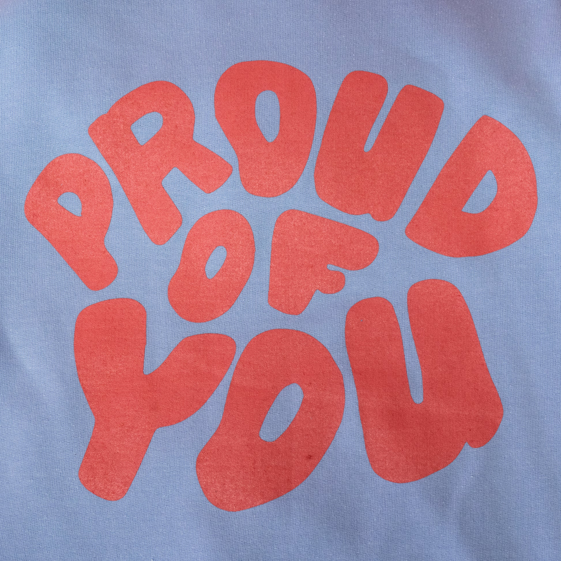 proud of you pink writing on sweatshirt