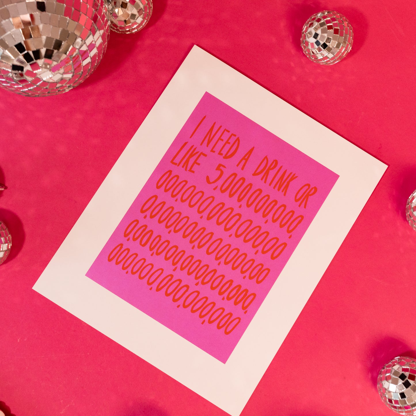 pink print with red lettering and white border