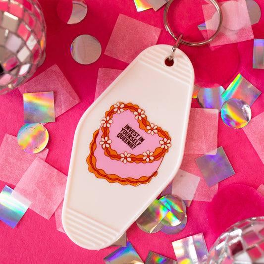 white keychain with pink cake