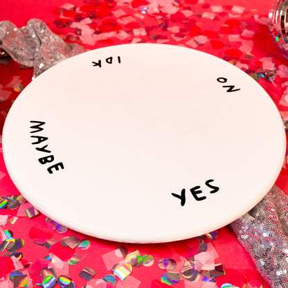 white plate with yes, no, idk , maybe