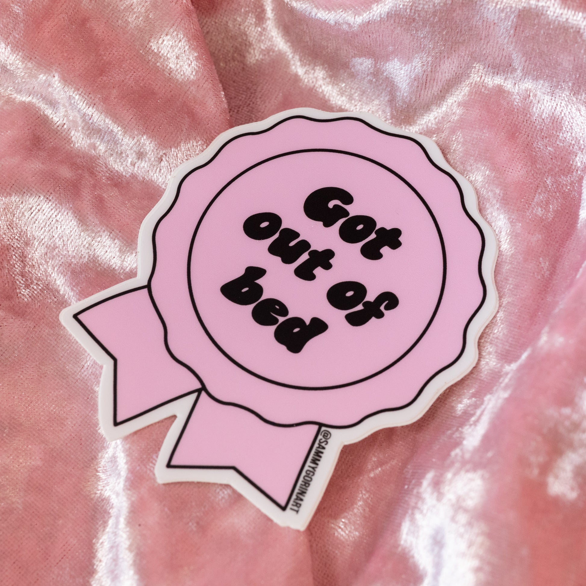 pink and black ribbon sticker