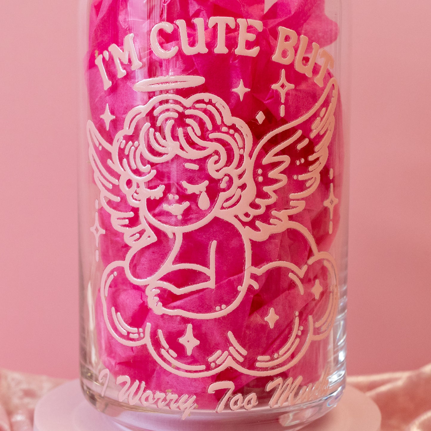 pink angel on clear glass