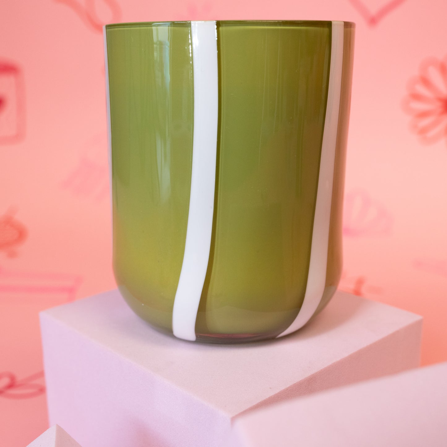 green candle with white stripes