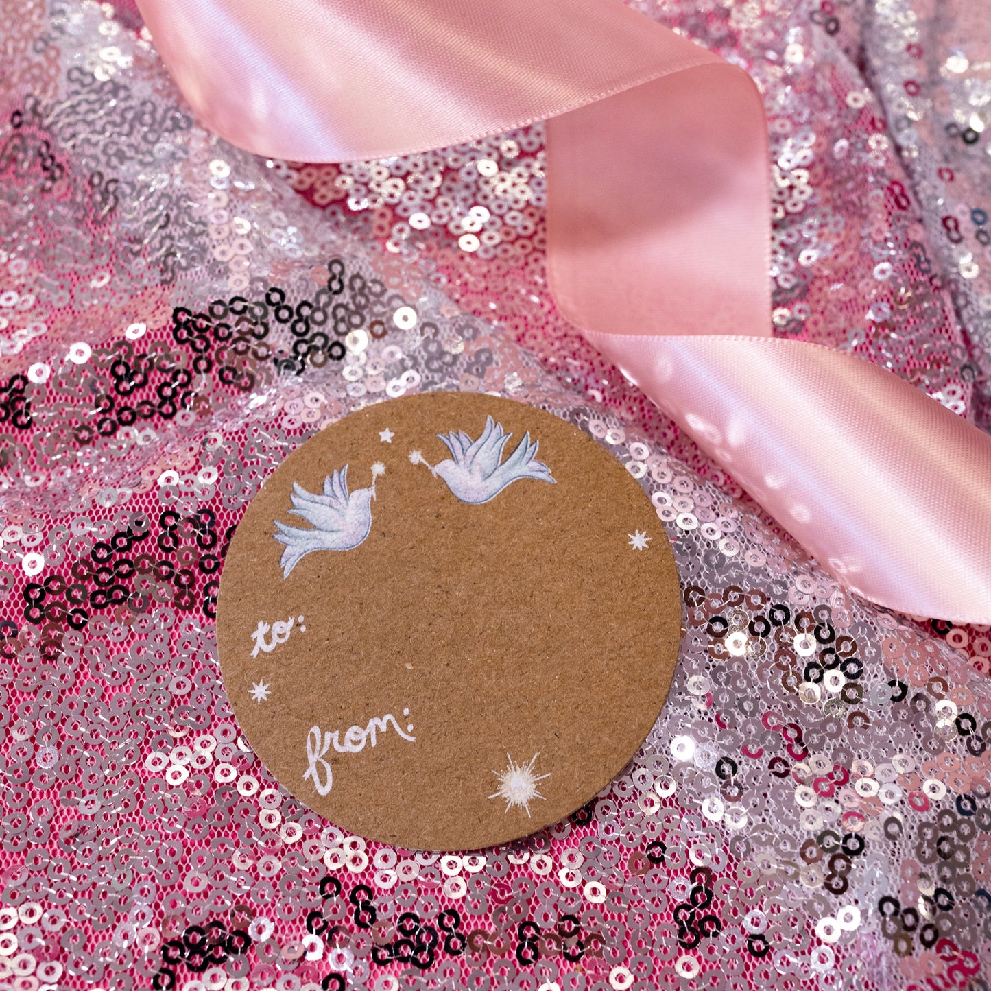 brown gift tag with blue doves