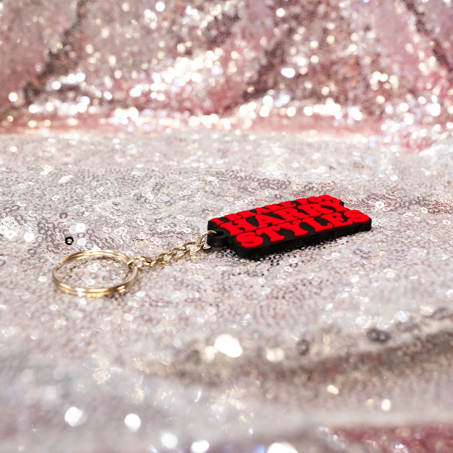 red, silver and black keychain