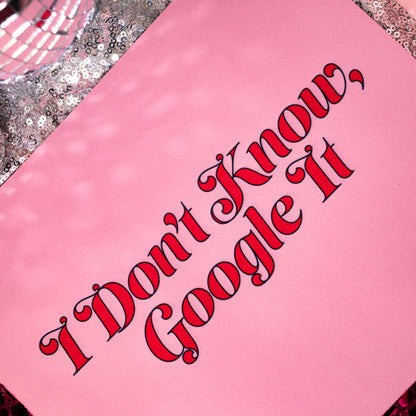 pink mousepad with red lettering