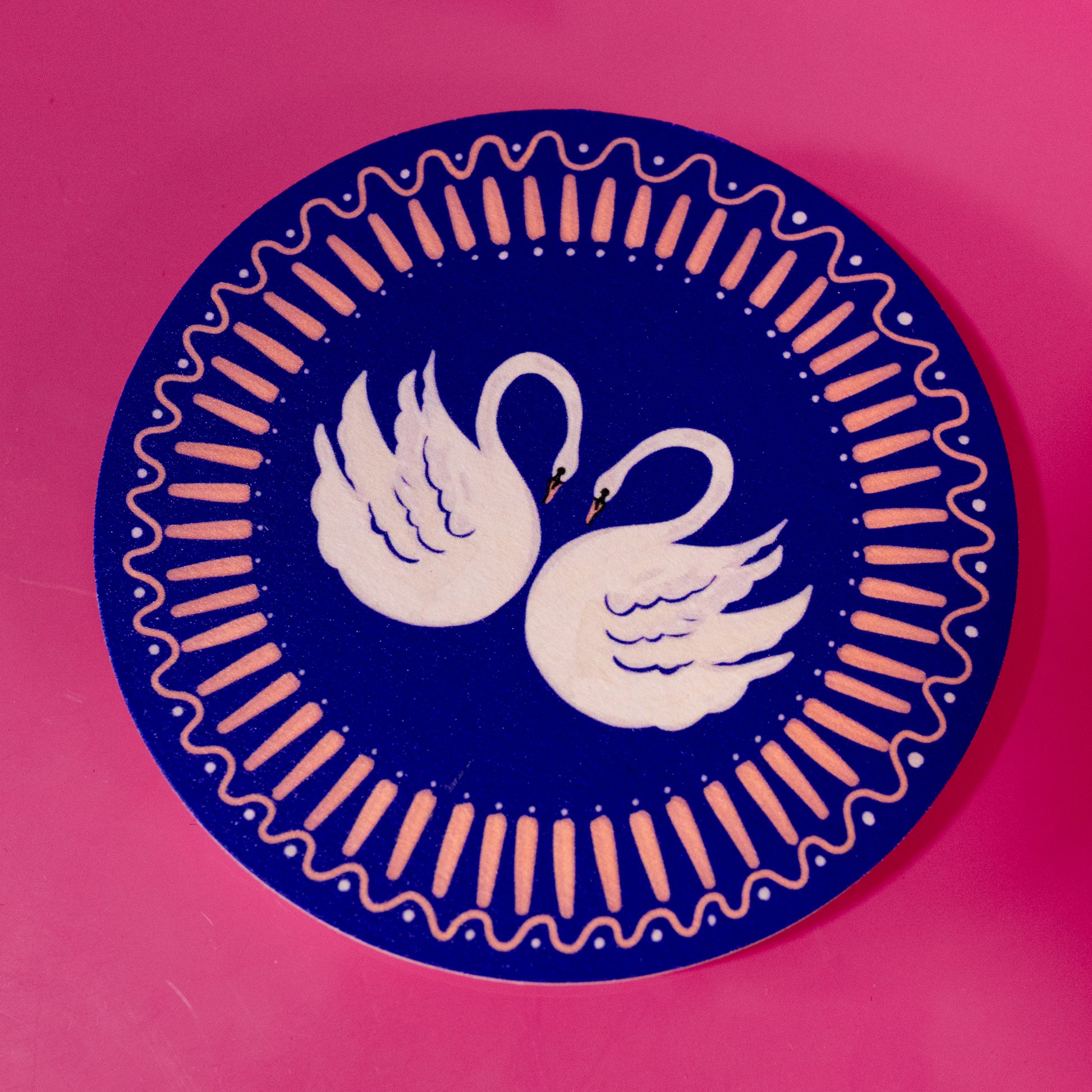 blue and white swan coaster