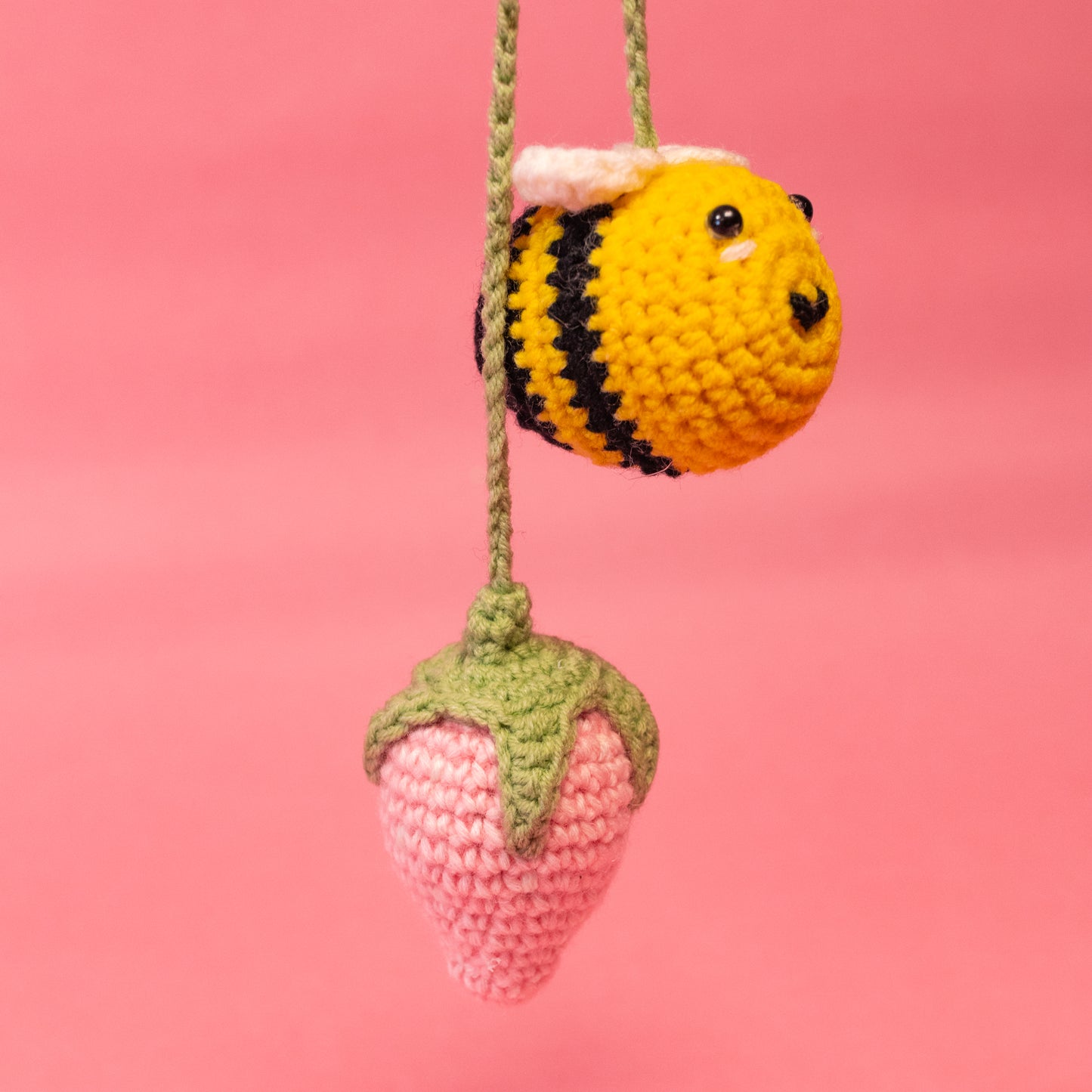 black and yellow bee crochet car hang with strawberry