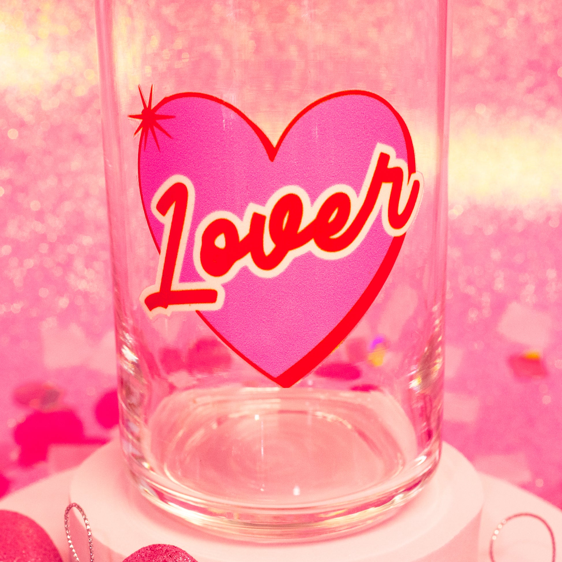 pink heart with orange words