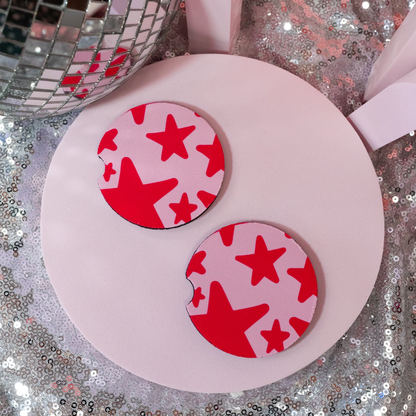pink coaster with pink stars