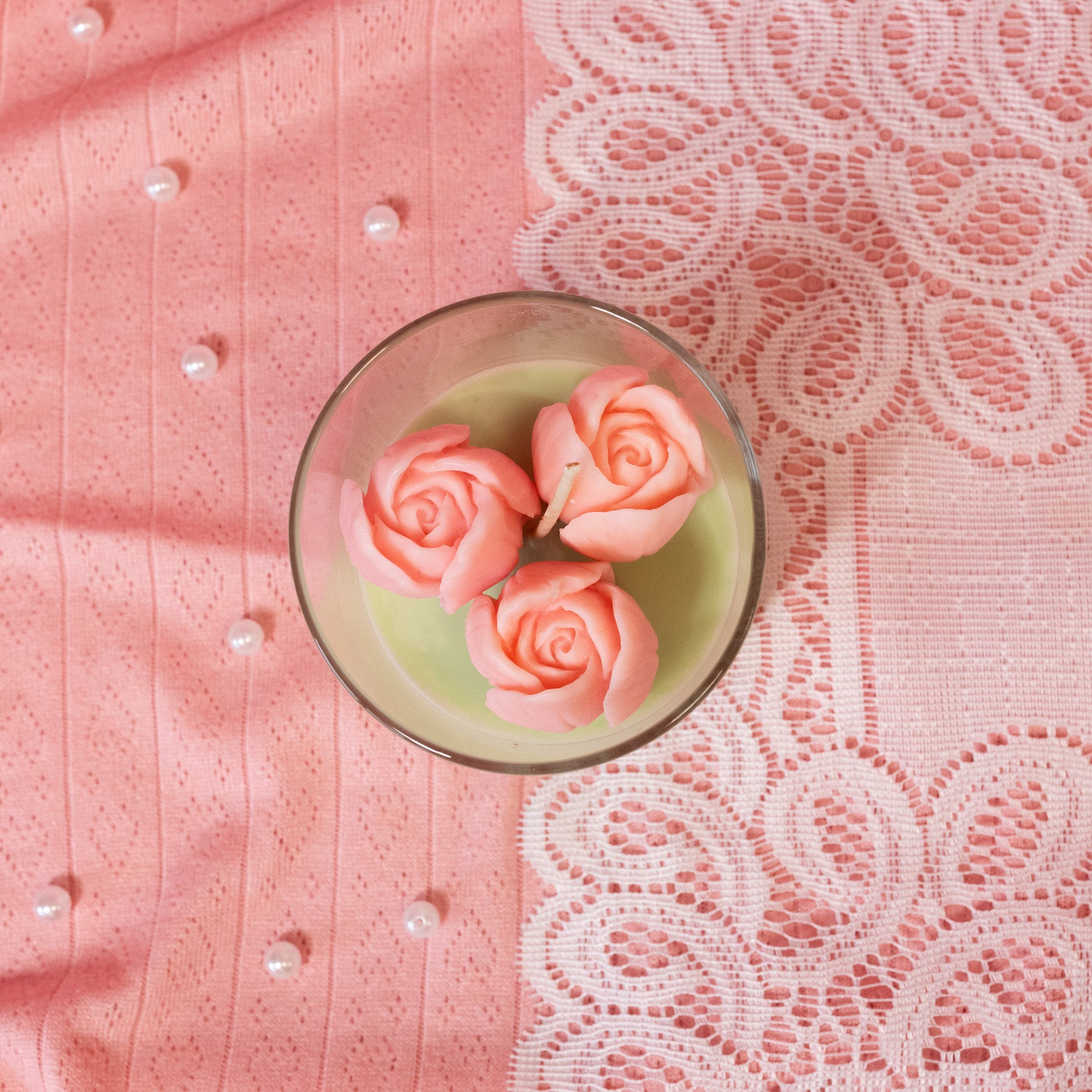 pink tulips in jar candle