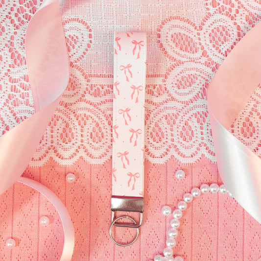 white keychain with pink bows