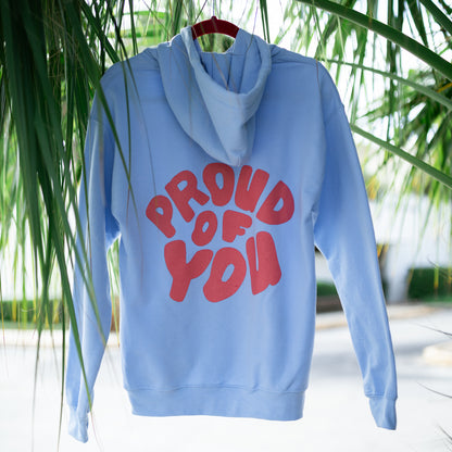 blue hoodie with pink writing proud of you