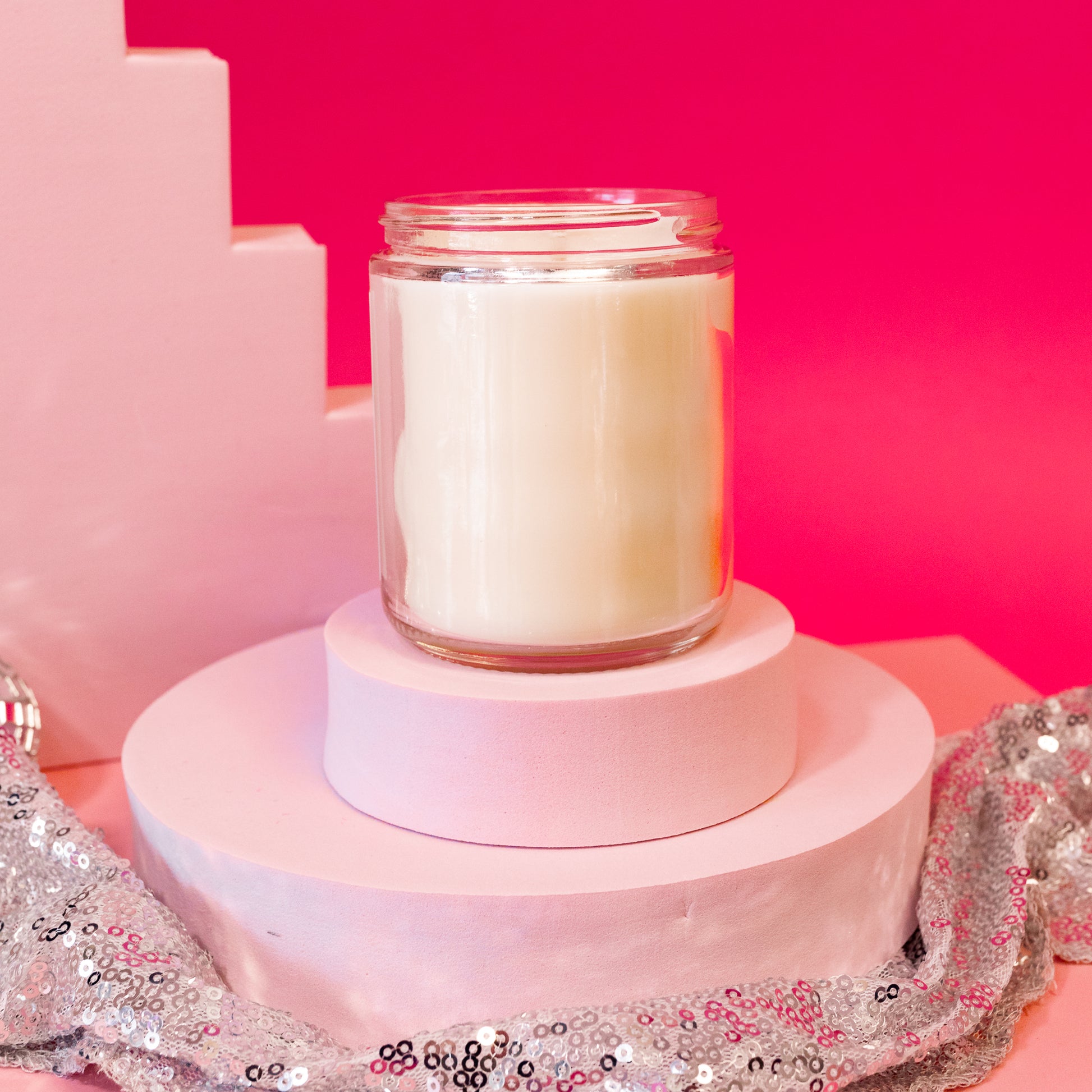 white and clear jar candle