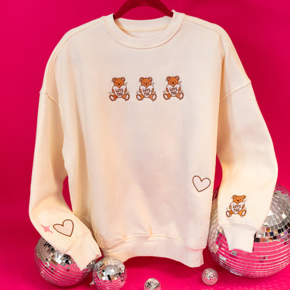 cream pink and brown sweatshirt