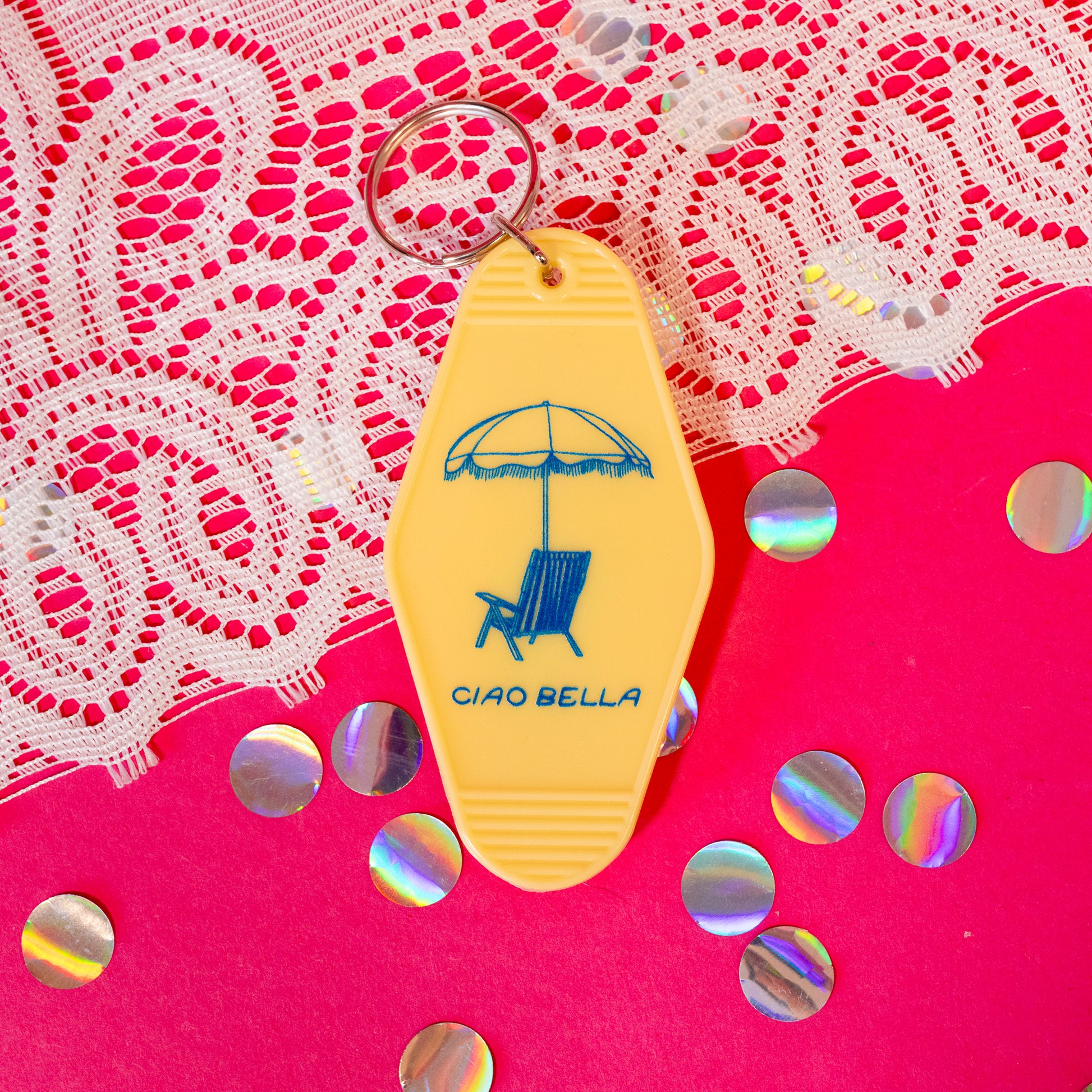 yellow keychain with blue design