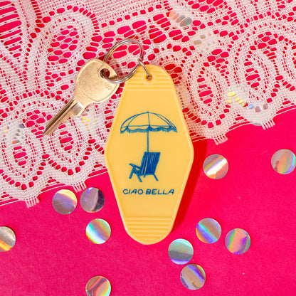 yellow keychain with ciao bella in blue lettering