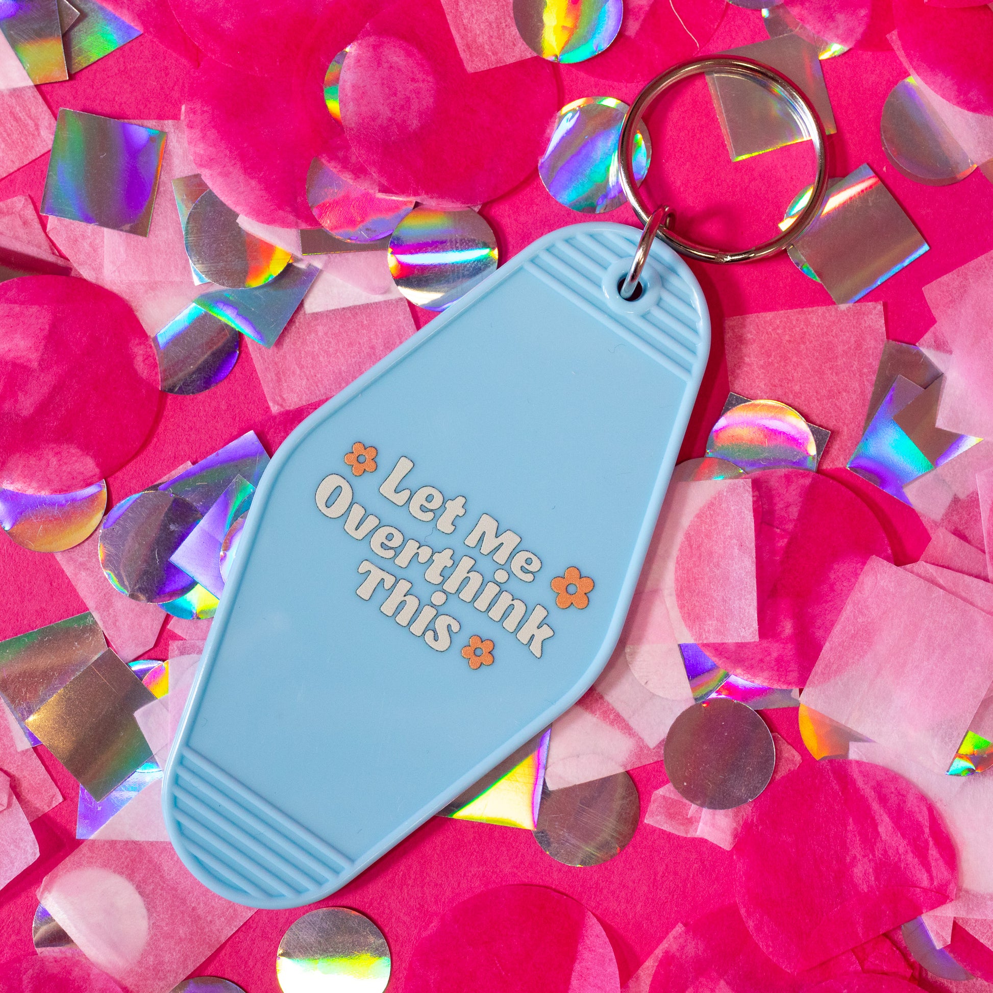 light blue and white and orange keychain