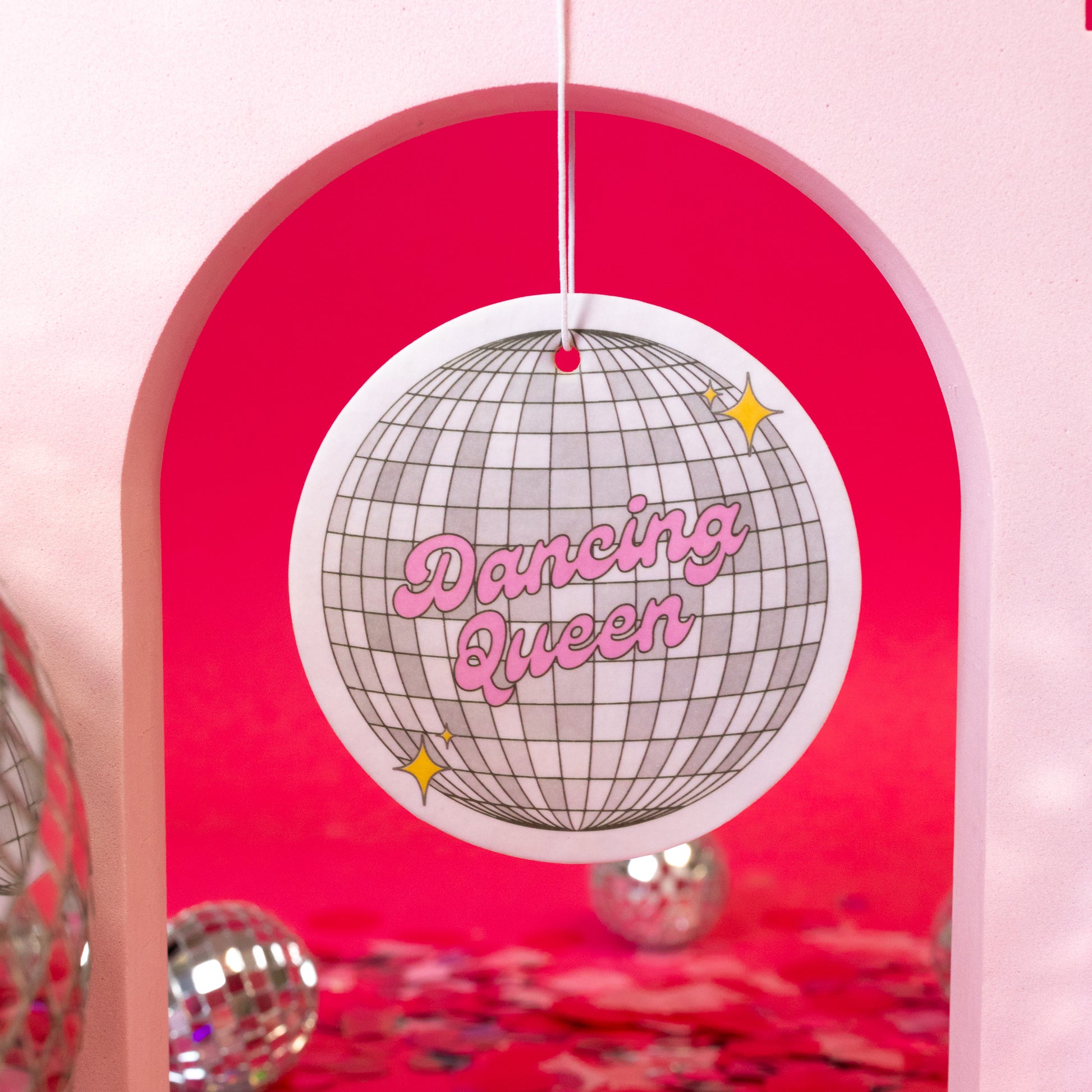 silver and pink air freshener