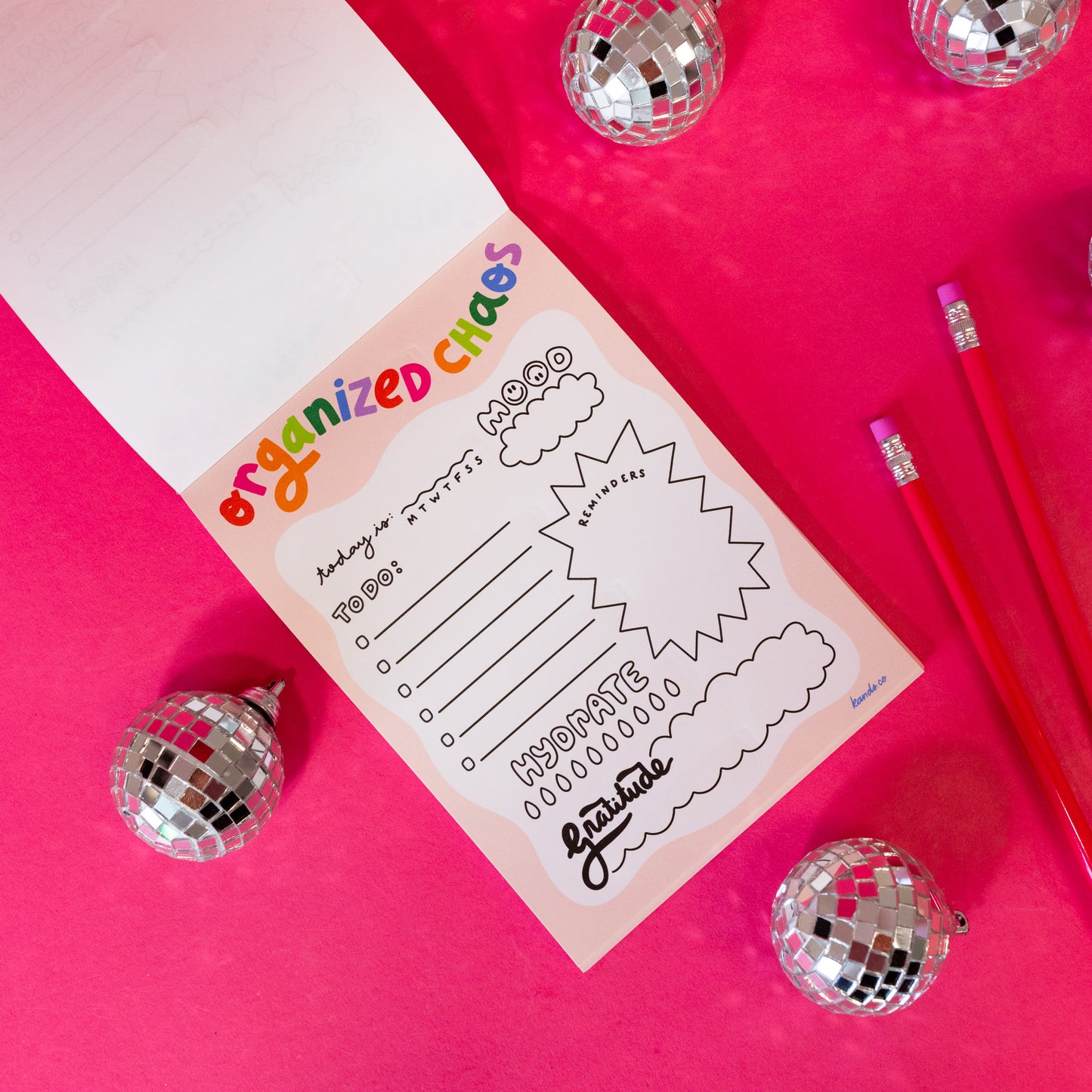 pink white and rainbow notepad