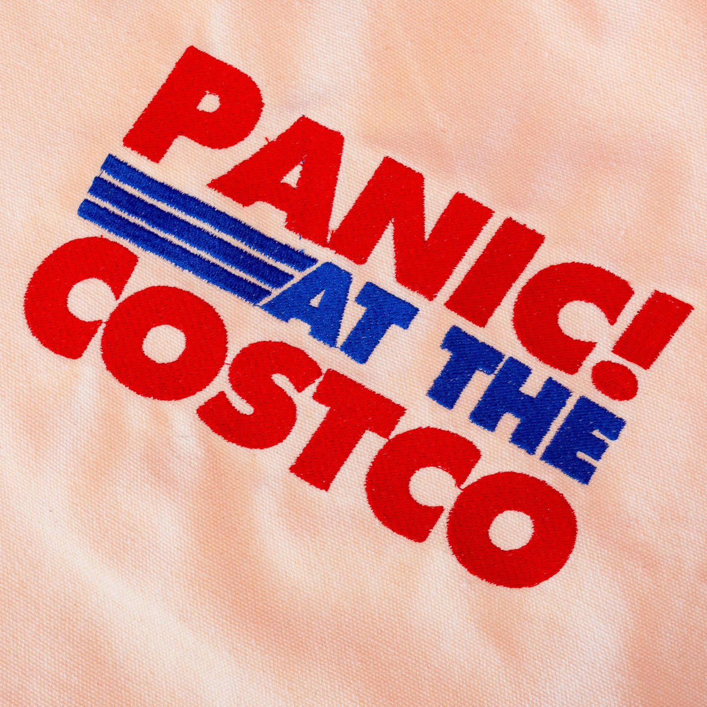 panic at the costco red and blue lettering 
