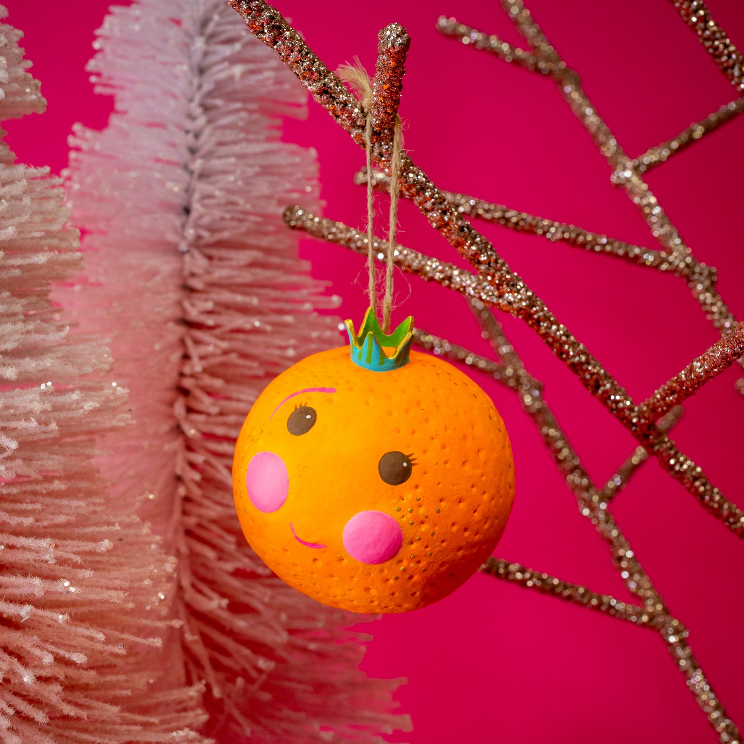 orange christmas ornament with crown 