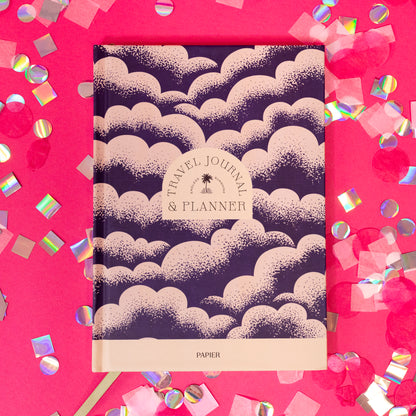 purple planner with clouds design