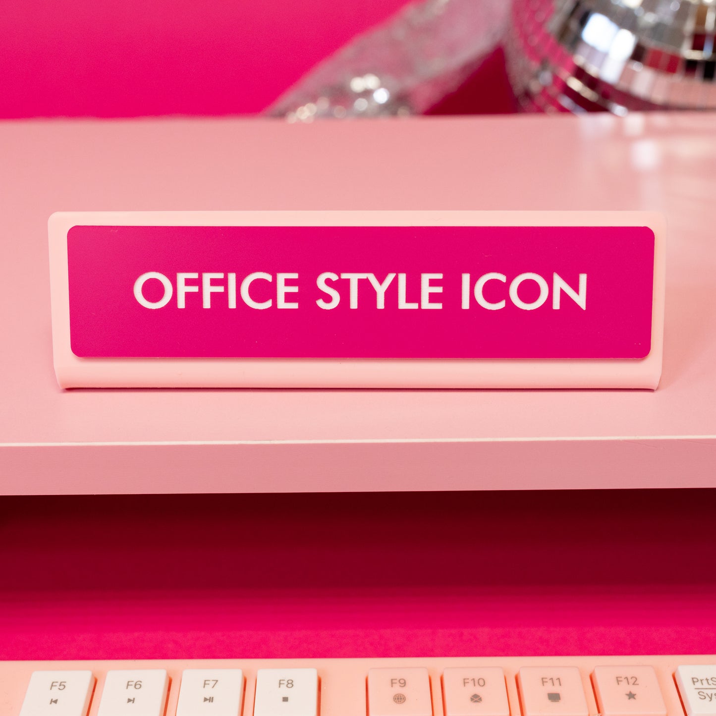 office style icon pink and light pink desk sign