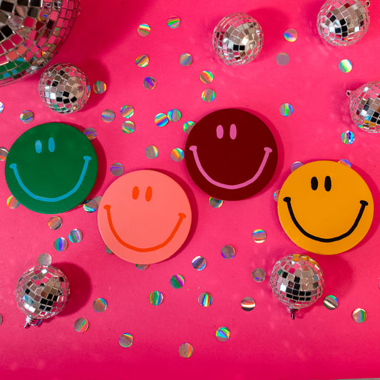 colorful smiley face coasters