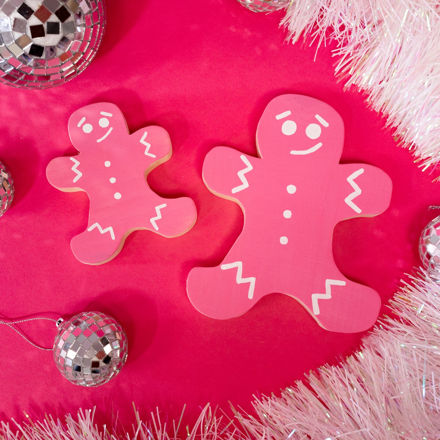 pink wooden gingerbread men christmas decoration