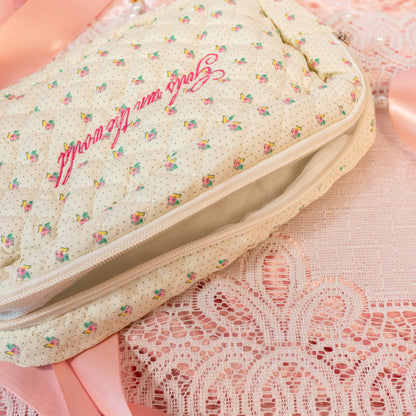 floral pouch with pink words