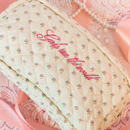 beige pouch with pink embroider