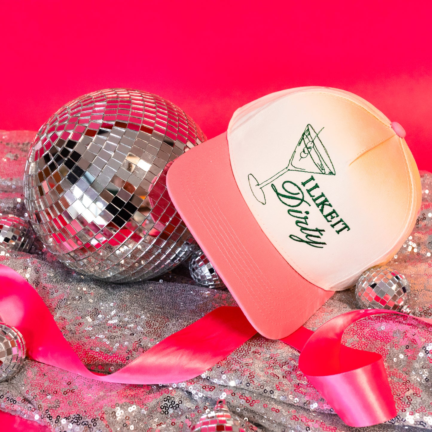 pink and green trucker hat