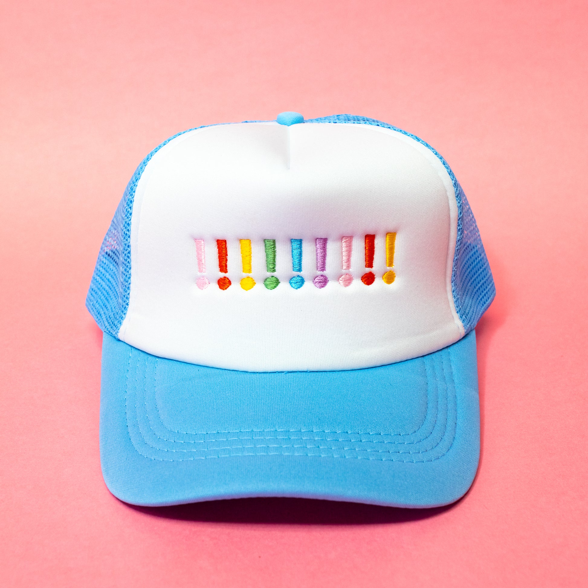 blue and white hat with exclamation points 