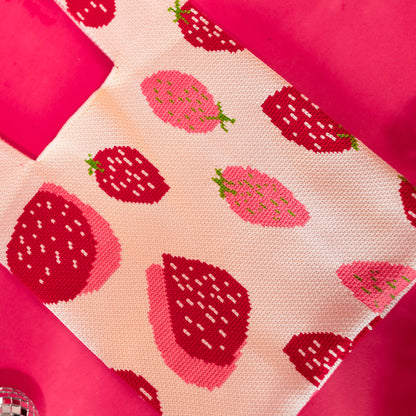 white bag with strawberries