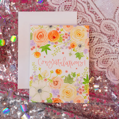 white card with yellow, pink, purple and white florals