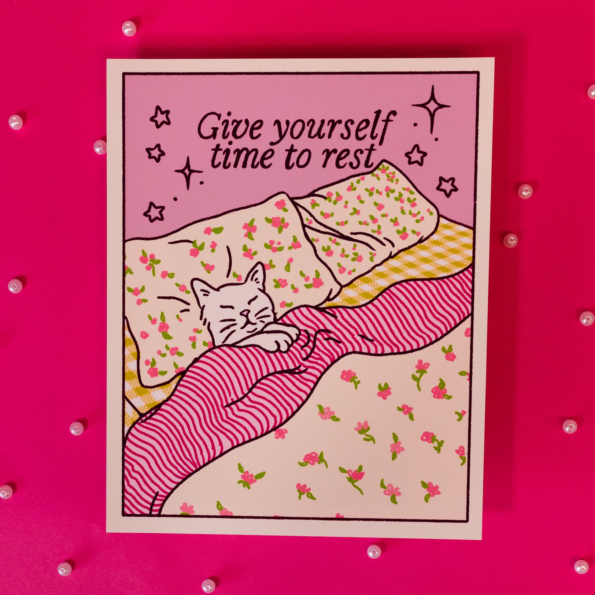 pink print with cat and bed