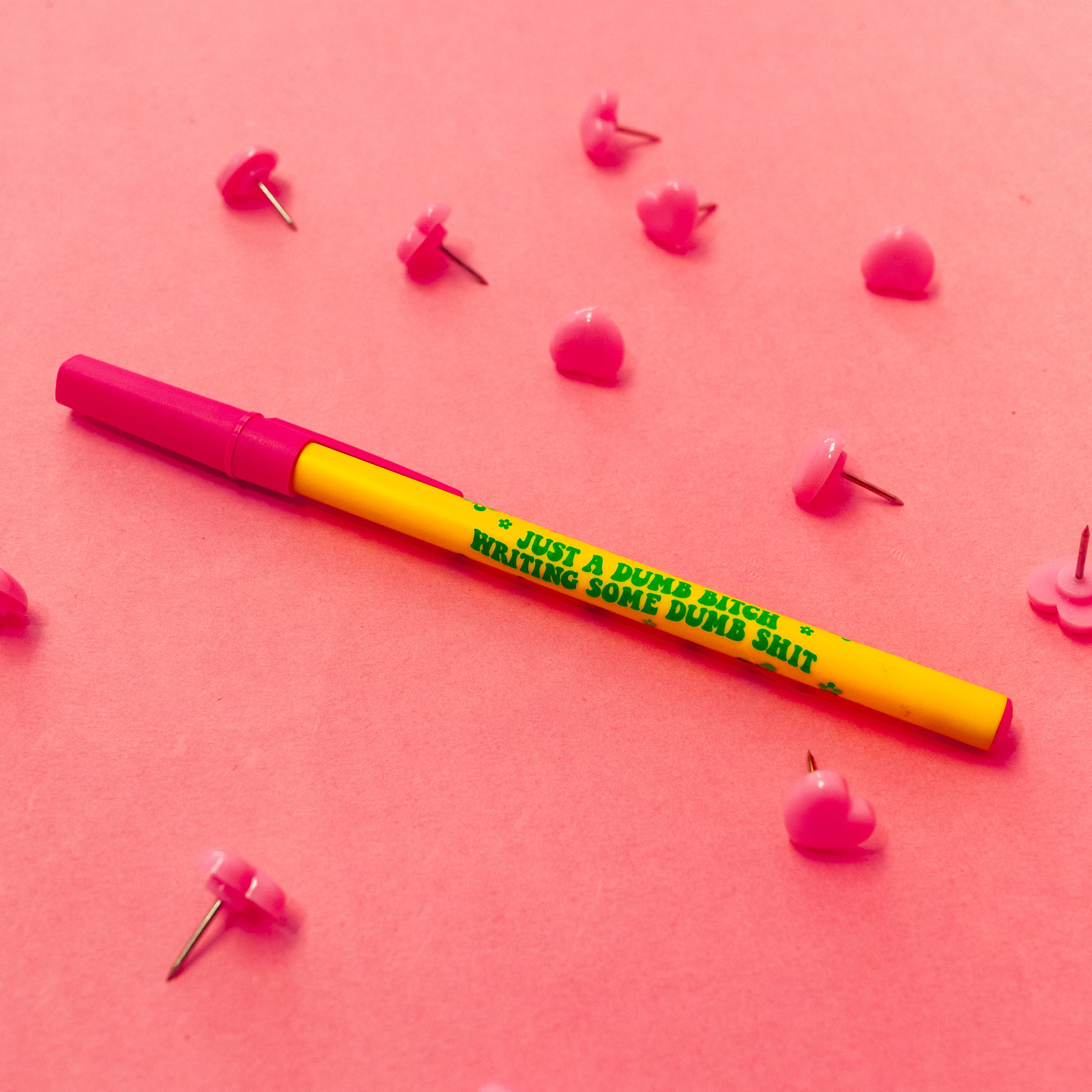 pink and yellow pen
