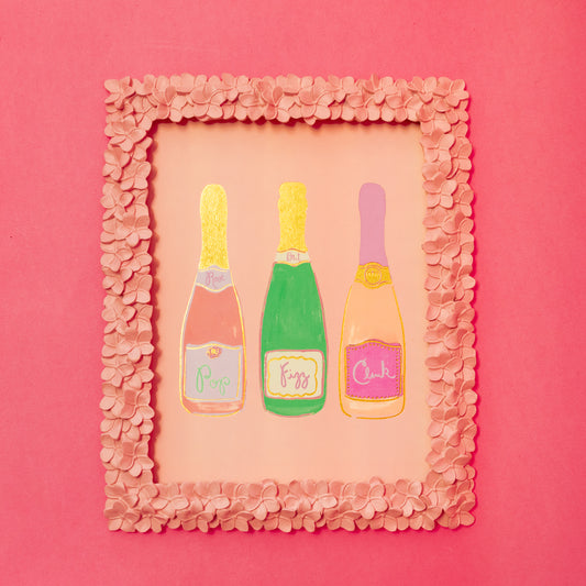 three colorful champagne bottles