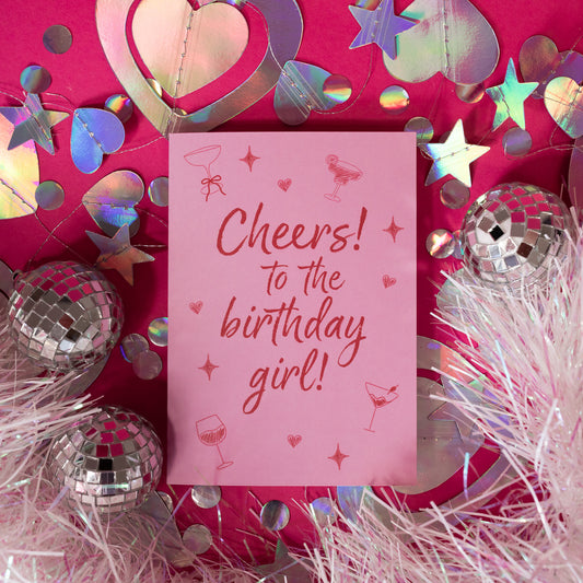 pink card with red words