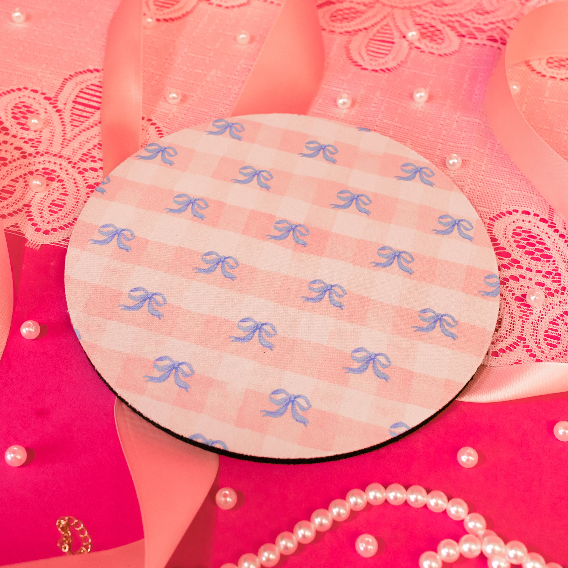 pink and bkue round mousepad