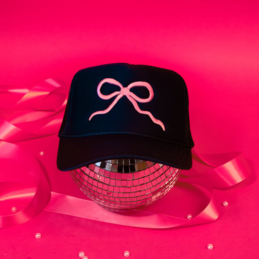 navy hat with pink bow