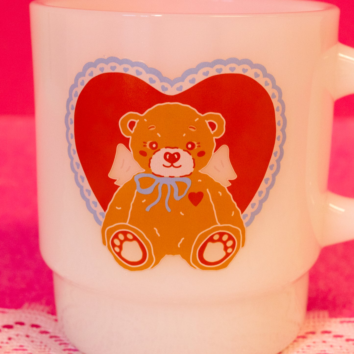 white mug with brown teddy bear red hearts and blue hearts