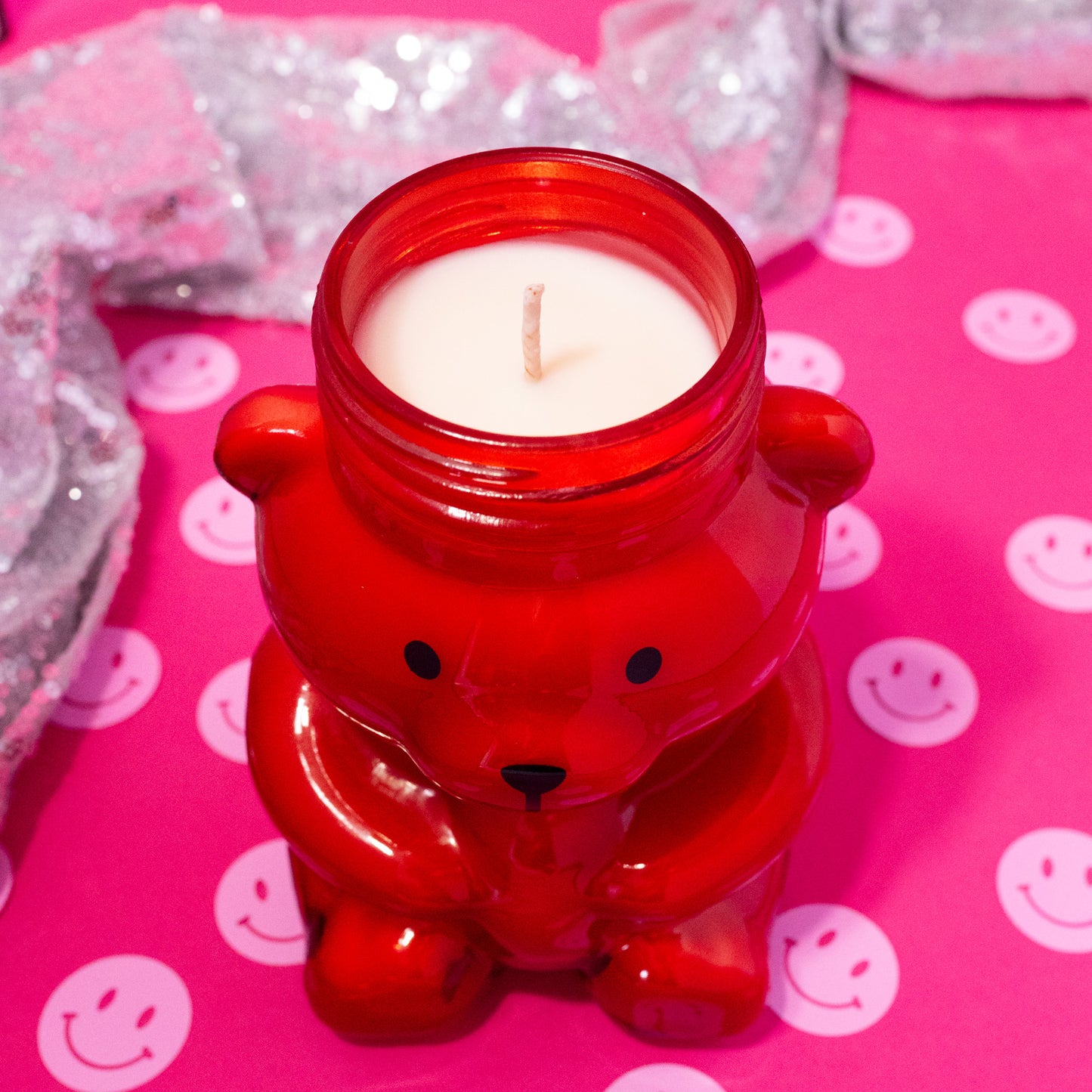 red candle shaped like a bear