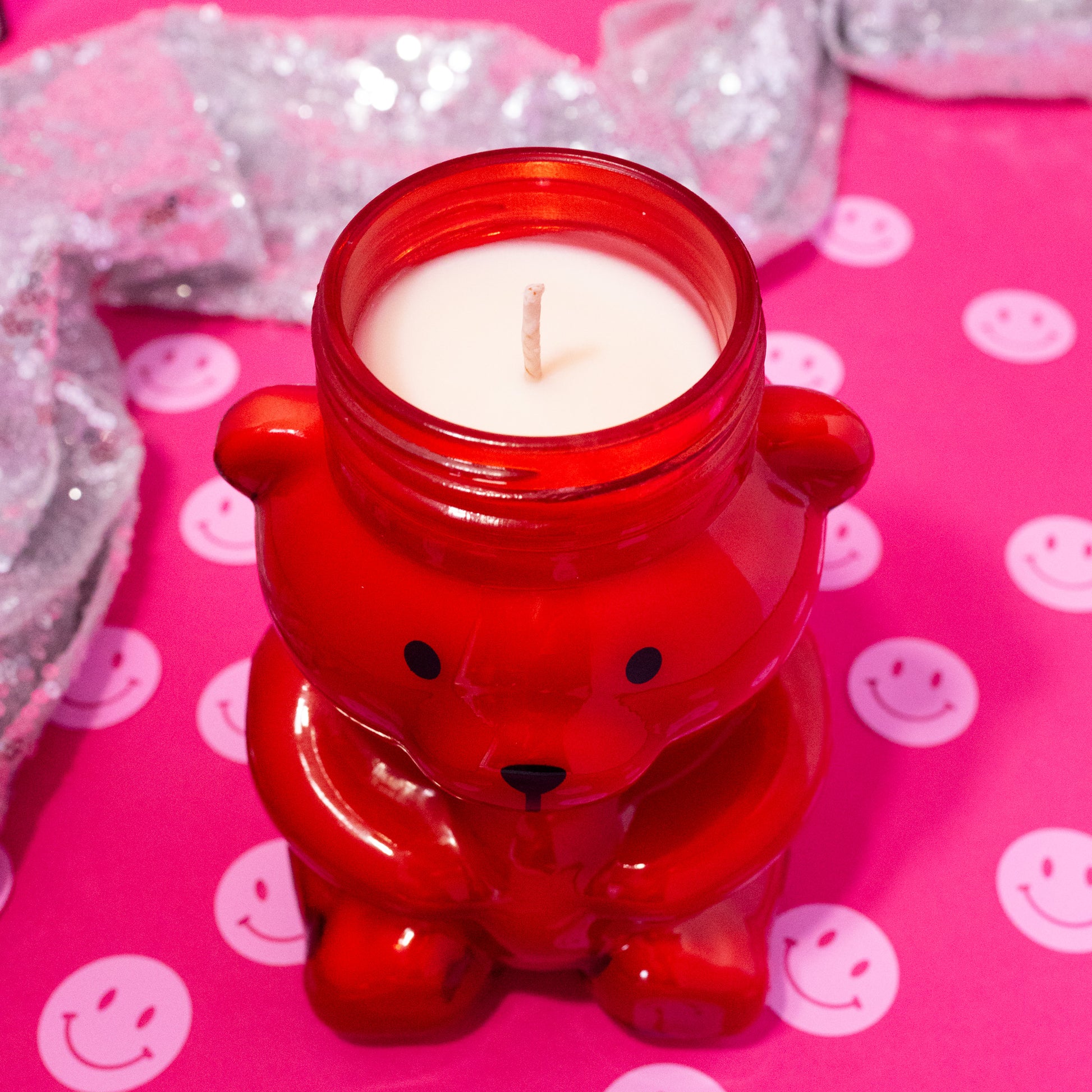 red candle shaped like a bear