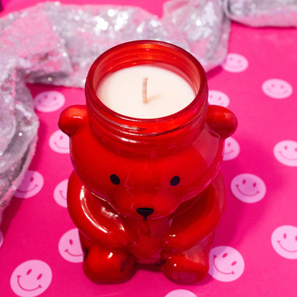 red candle shaped like a bear