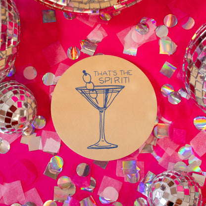 beige coaster with blue cocktail