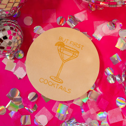 coaster with yellow cocktails